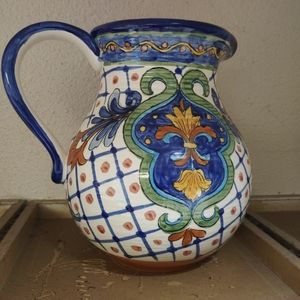 7 ceramic pitchers